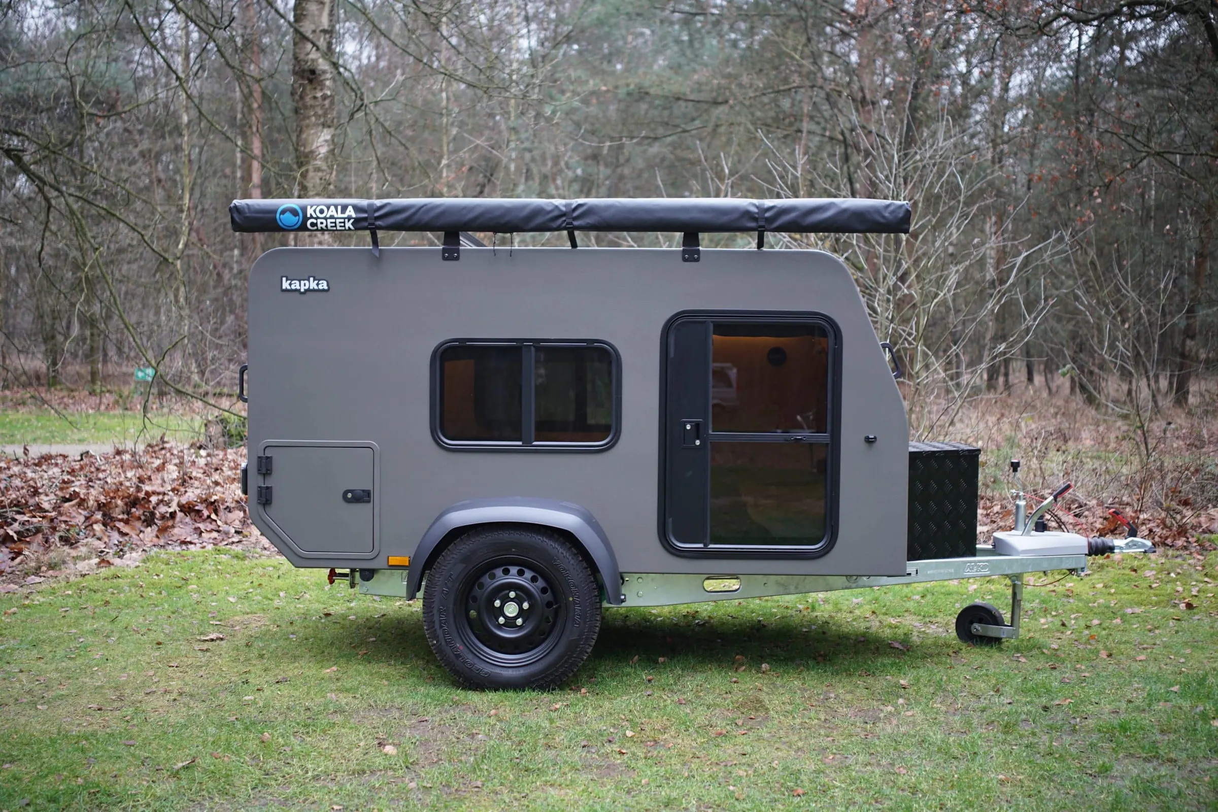 Minicaravan Magellaan in het bos